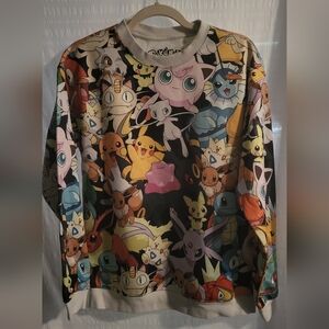 Pokemon sweatshirt.  Pikachu, has all the characters.  Unisex size medium